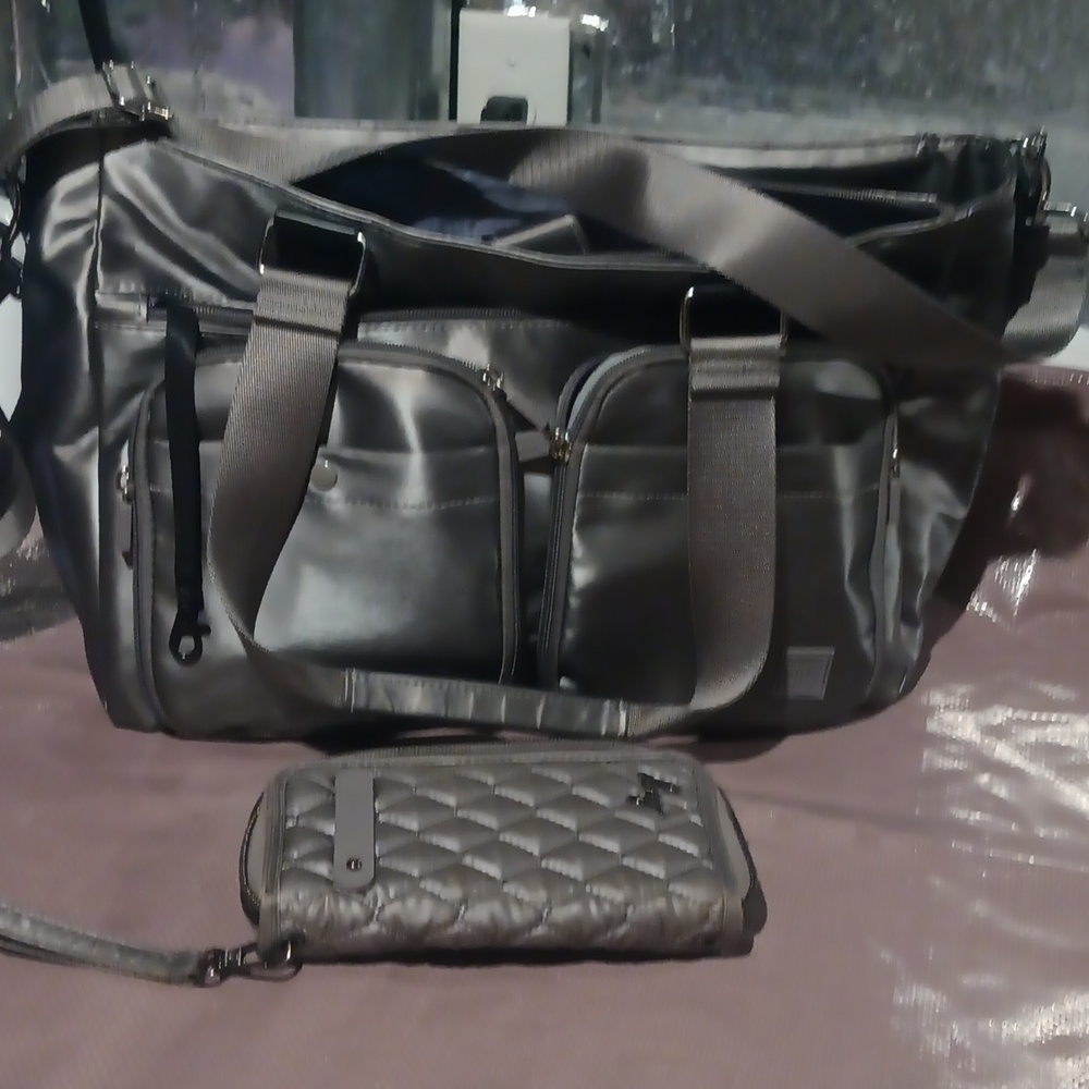 New Silver Bag With Great Storage Pockets
